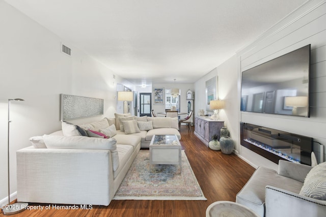 4008 Passport Ln, New Port Richey, FL 34653 - living room featuring wood finished floors and baseboards