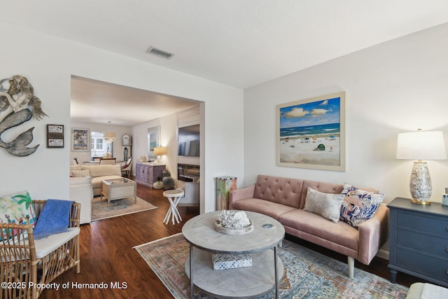 4008 Passport Ln, New Port Richey, FL 34653 - living area featuring wood finished floors