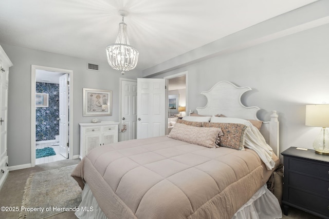 4008 Passport Ln, New Port Richey, FL 34653 - carpeted bedroom with a chandelier, baseboards, and ensuite bathroom