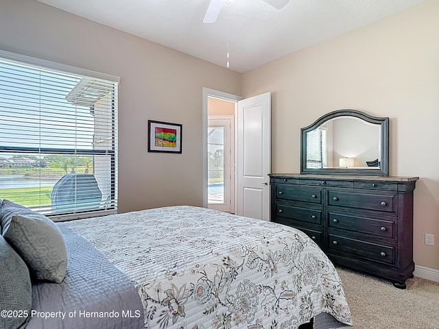 bedroom with carpet, baseboards, and ceiling fan