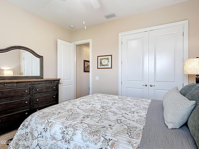 bedroom featuring a closet and ceiling fan
