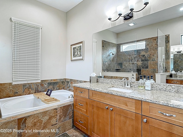 full bath with a walk in shower, a bath, and vanity