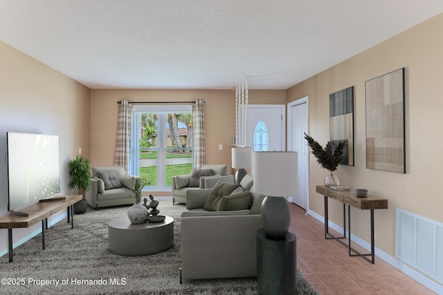 4446 San Juan Dr, Hernando Beach, FL 34607 - living room featuring baseboards