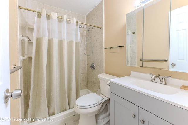 4446 San Juan Dr, Hernando Beach, FL 34607 - bathroom featuring toilet, vanity, and a tile shower