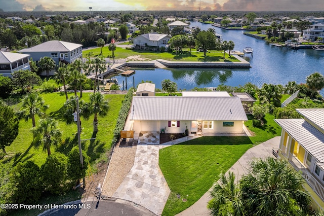 4446 San Juan Dr, Hernando Beach, FL 34607 - aerial view of residential area featuring a large body of water