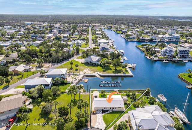 4446 San Juan Dr, Hernando Beach, FL 34607 - aerial perspective of suburban area with a nearby body of water
