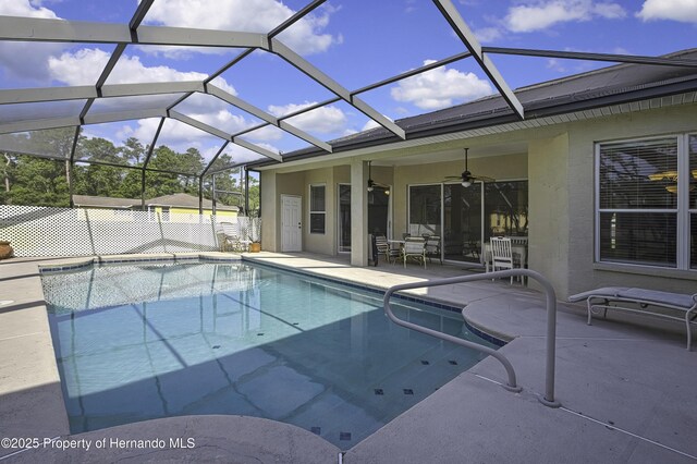 11336 Flower Ave, Weeki Wachee, FL 34613 - pool with a patio area, a lanai, and a ceiling fan
