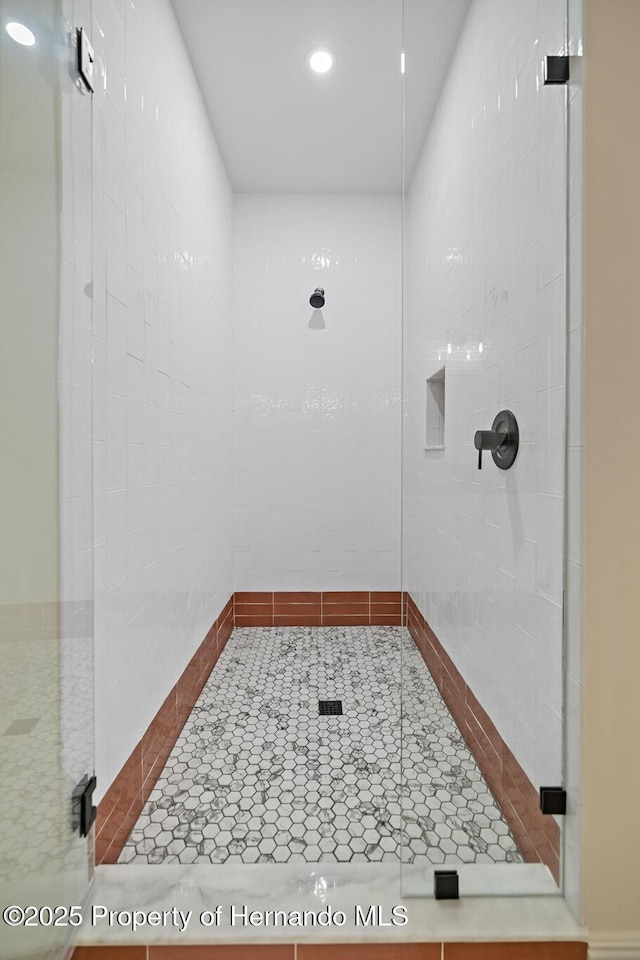 full bathroom with a shower stall, recessed lighting, and tile patterned flooring