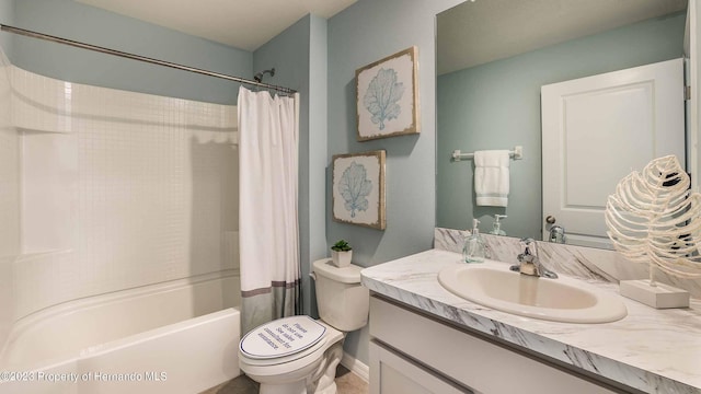 full bath with toilet, vanity, and shower / bath combination with curtain