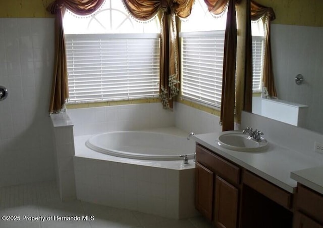 4301 Blakemore, Spring Hill, FL 34609 - full bath with a garden tub, vanity, and tile patterned flooring