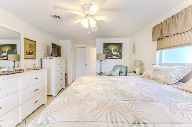bedroom featuring ceiling fan