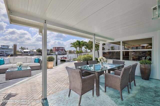 view of patio / terrace with outdoor lounge area and outdoor dining area