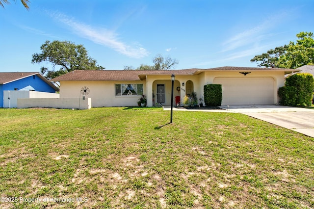 5078 Kenmore St, Spring Hill, FL 34608 - single story home featuring stucco siding, concrete driveway, and an attached garage