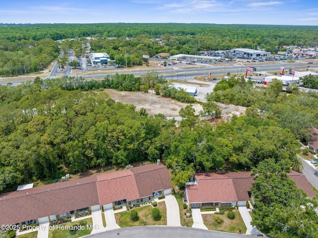 drone / aerial view of a heavily wooded area