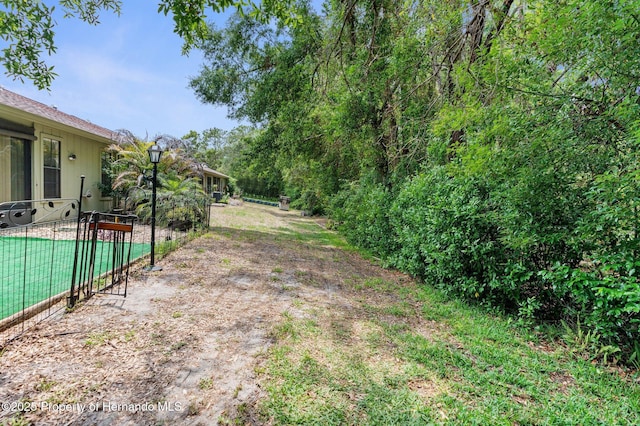 view of yard with fence