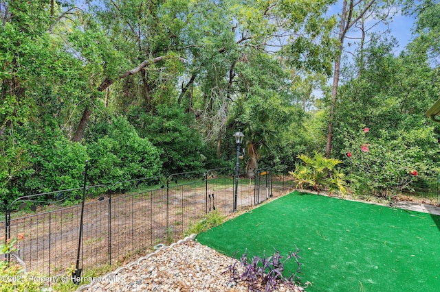 view of yard featuring fence