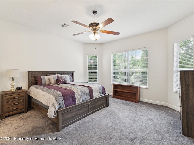 bedroom with carpet floors, baseboards, and ceiling fan