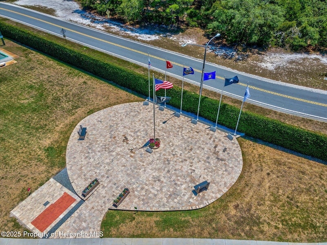 surrounding community featuring a yard