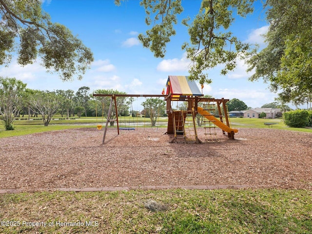 view of playground with a yard