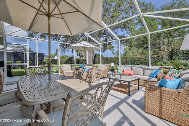 view of patio / terrace with outdoor lounge area and a lanai