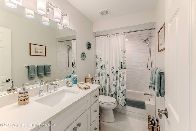 full bath with toilet, tile patterned floors, shower / bath combo, and vanity