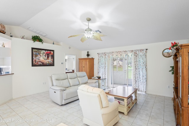 12271 House Finch Rd, Weeki Wachee, FL 34614 - living area with ceiling fan, lofted ceiling, and light tile patterned flooring