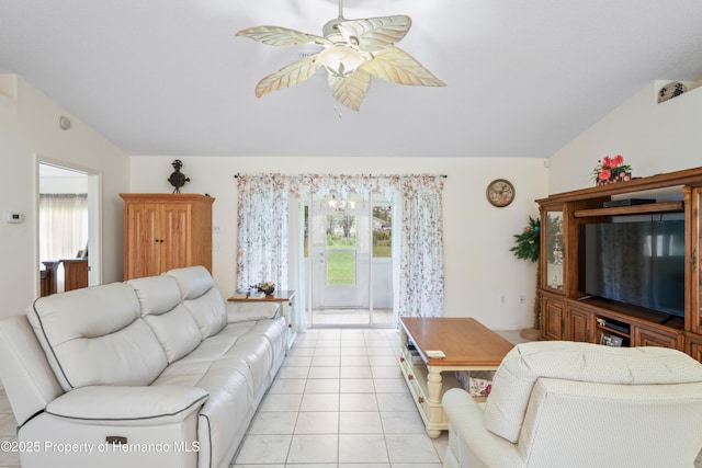 12271 House Finch Rd, Weeki Wachee, FL 34614 - living room with plenty of natural light, ceiling fan, light tile patterned floors, and lofted ceiling