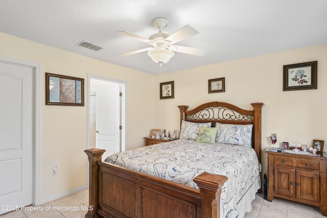 12271 House Finch Rd, Weeki Wachee, FL 34614 - bedroom featuring light tile patterned flooring and ceiling fan