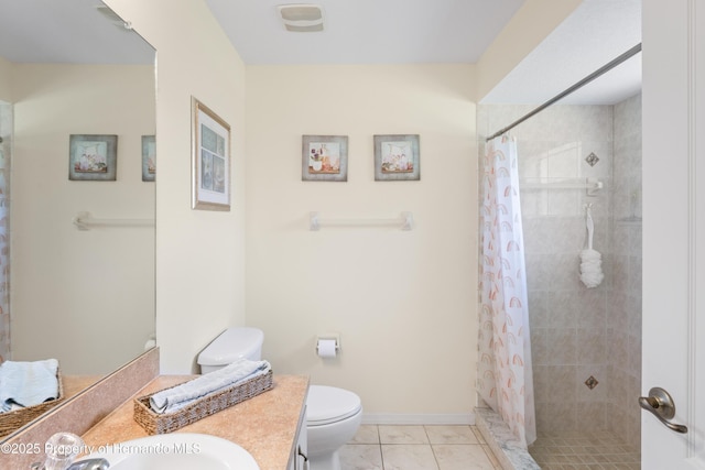 12271 House Finch Rd, Weeki Wachee, FL 34614 - bathroom featuring toilet, vanity, tiled shower, and tile patterned floors