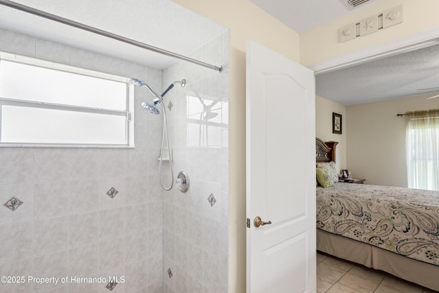 12271 House Finch Rd, Weeki Wachee, FL 34614 - full bath with a tile shower, ensuite bath, and tile patterned flooring