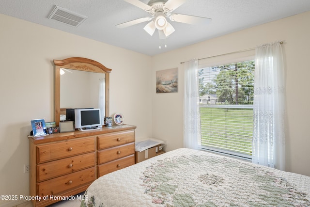 12271 House Finch Rd, Weeki Wachee, FL 34614 - bedroom with a ceiling fan