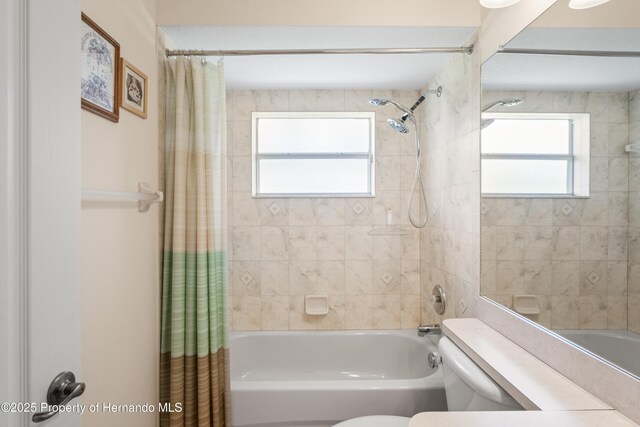12271 House Finch Rd, Weeki Wachee, FL 34614 - full bathroom with shower / bath combination with curtain and toilet