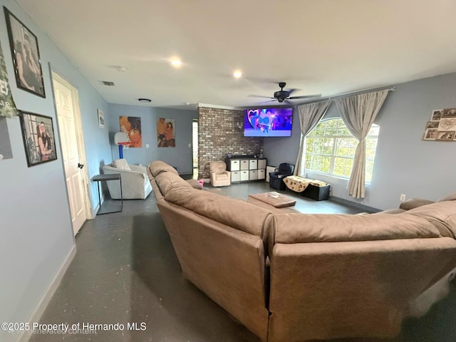 11080 Jackdaw Rd, Weeki Wachee, FL 34613 - living room featuring baseboards, concrete floors, and a ceiling fan