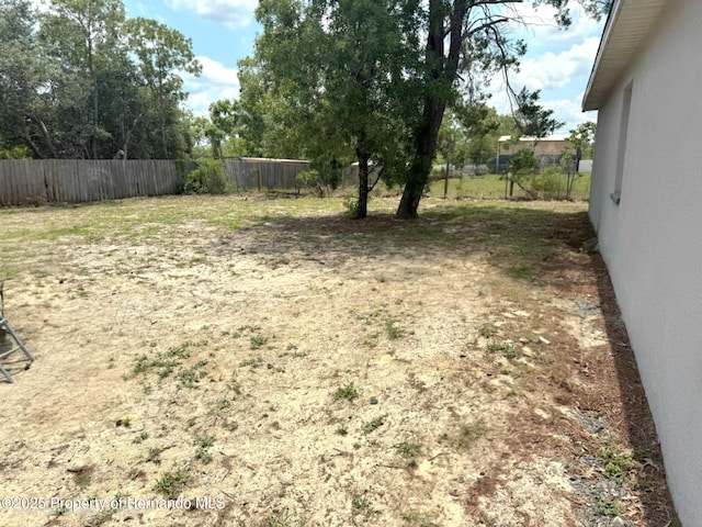 11080 Jackdaw Rd, Weeki Wachee, FL 34613 - view of yard featuring fence