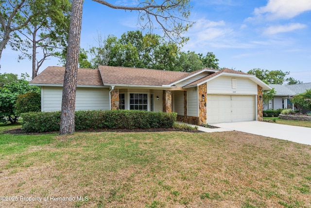 ranch-style home with a garage, stone siding, driveway, and a front yard