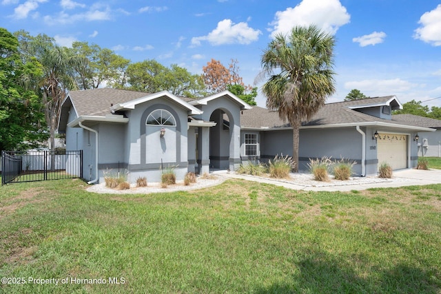 ranch-style home with stucco siding, a garage, concrete driveway, and roof with shingles