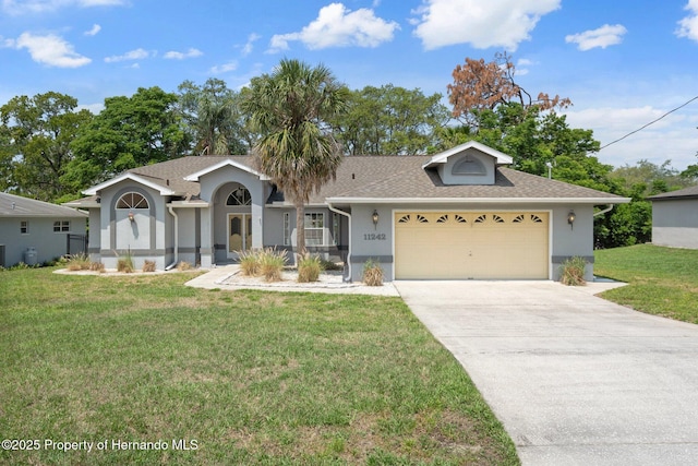 single story home featuring stucco siding, driveway, a front yard, and an attached garage