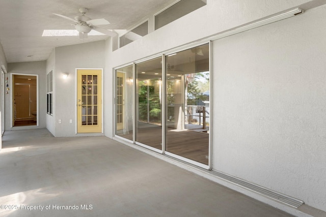 view of patio / terrace featuring ceiling fan