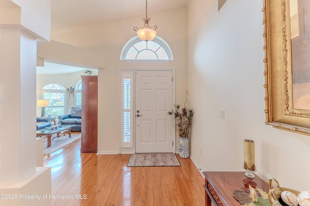 11750 Teapot Ct, Spring Hill, FL 34609 - foyer with light wood-style flooring