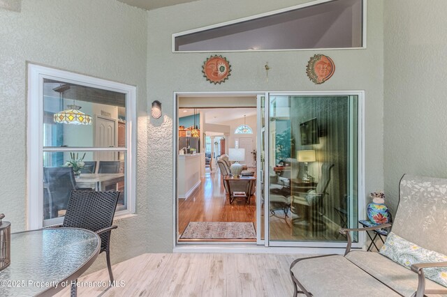 11750 Teapot Ct, Spring Hill, FL 34609 - view of exterior entry with stucco siding