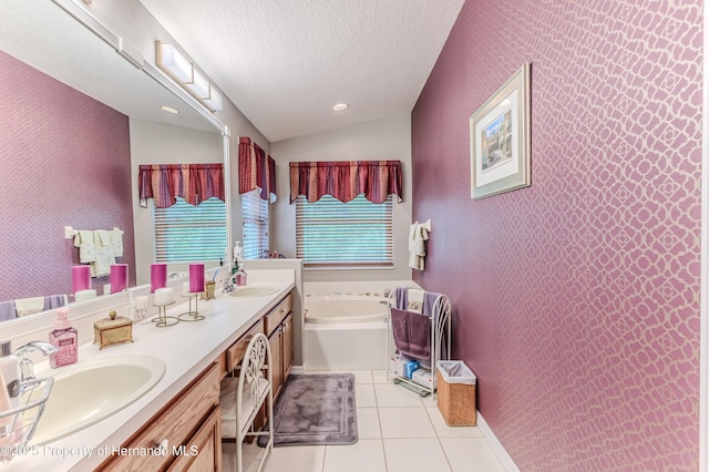 11750 Teapot Ct, Spring Hill, FL 34609 - bathroom featuring vaulted ceiling, a bath, tile patterned floors, a textured ceiling, and double vanity