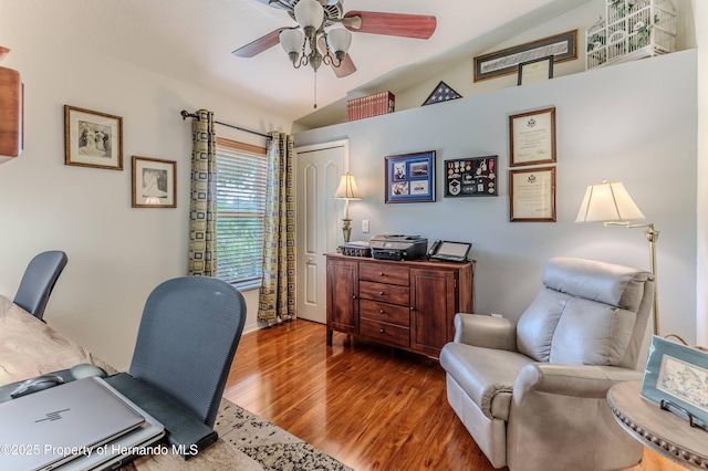 11750 Teapot Ct, Spring Hill, FL 34609 - office with wood finished floors, ceiling fan, and vaulted ceiling