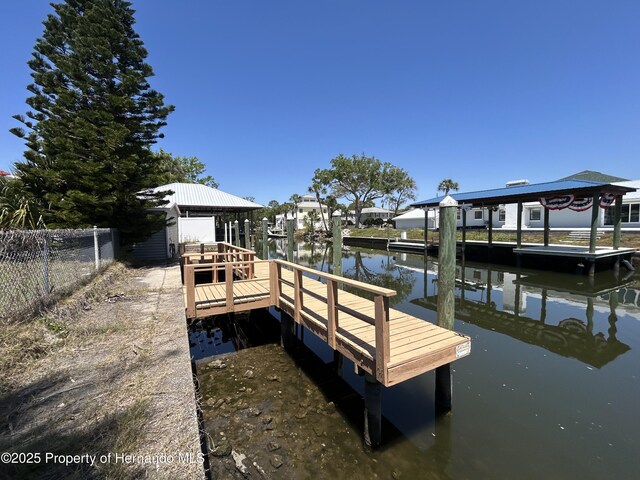 1731 NW 20th Ave, Crystal River, FL 34428 - dock area featuring a water view, fence, and a gazebo
