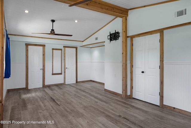 spare room featuring wainscoting, wood finished floors, ceiling fan, and recessed lighting
