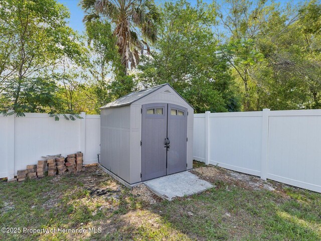 6076 Shiprock Ave, Spring Hill, FL 34608 - view of shed with a fenced backyard