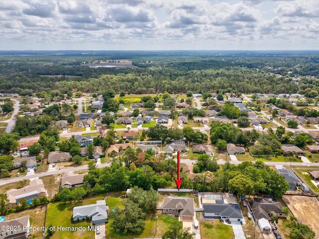 6076 Shiprock Ave, Spring Hill, FL 34608 - aerial view of residential area with a forest