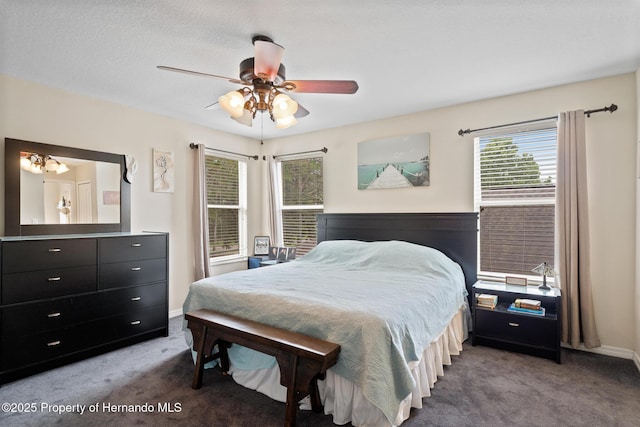 396 Winthrop Dr, Spring Hill, FL 34609 - carpeted bedroom with a ceiling fan and baseboards