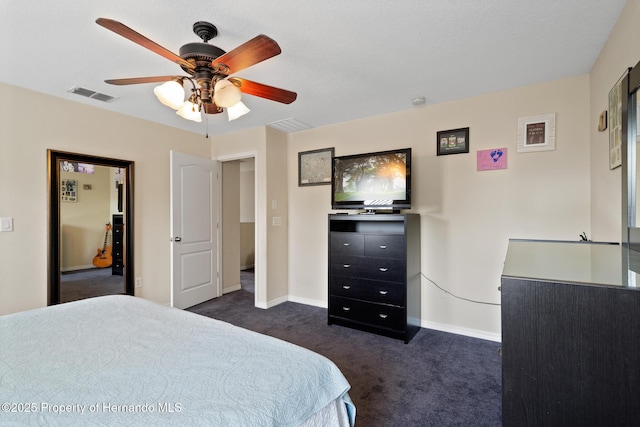 396 Winthrop Dr, Spring Hill, FL 34609 - bedroom featuring dark colored carpet, baseboards, and a ceiling fan