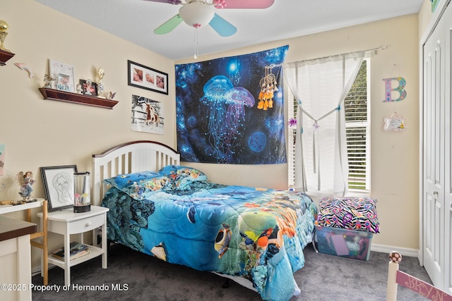 396 Winthrop Dr, Spring Hill, FL 34609 - bedroom with carpet floors and ceiling fan