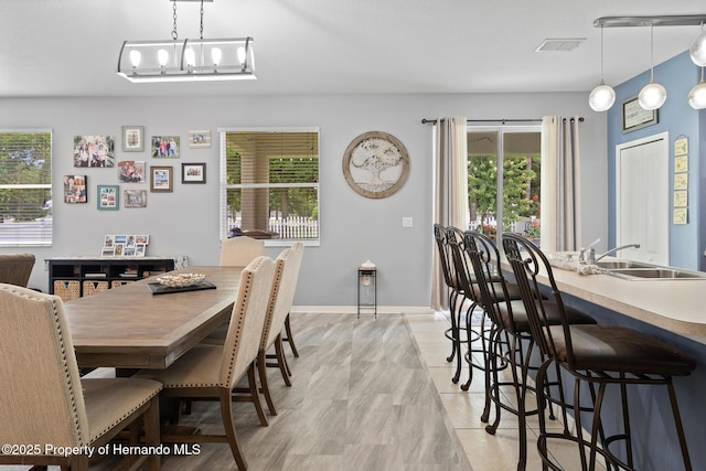 396 Winthrop Dr, Spring Hill, FL 34609 - dining room featuring healthy amount of natural light and baseboards